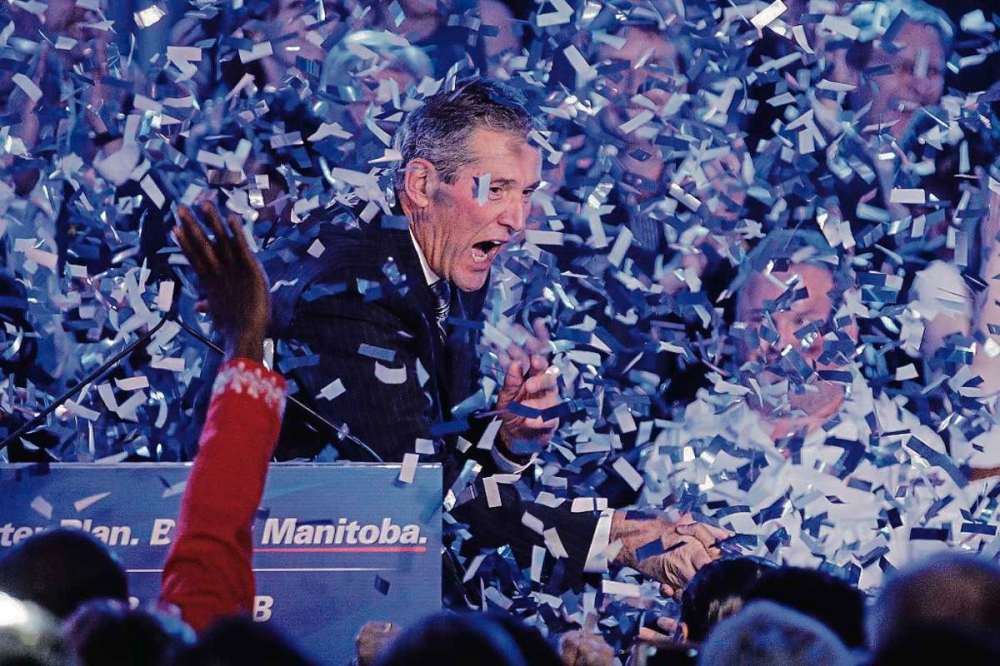 Mike Deal / Winnipeg Free Press
Premier-designate Brian Pallister shakes a hand at the conclusion of  his acceptance speech at Canad Inns Polo Park Tues., April 19 after his party won a majority of seats in the Manitoba Legislative Assembly.