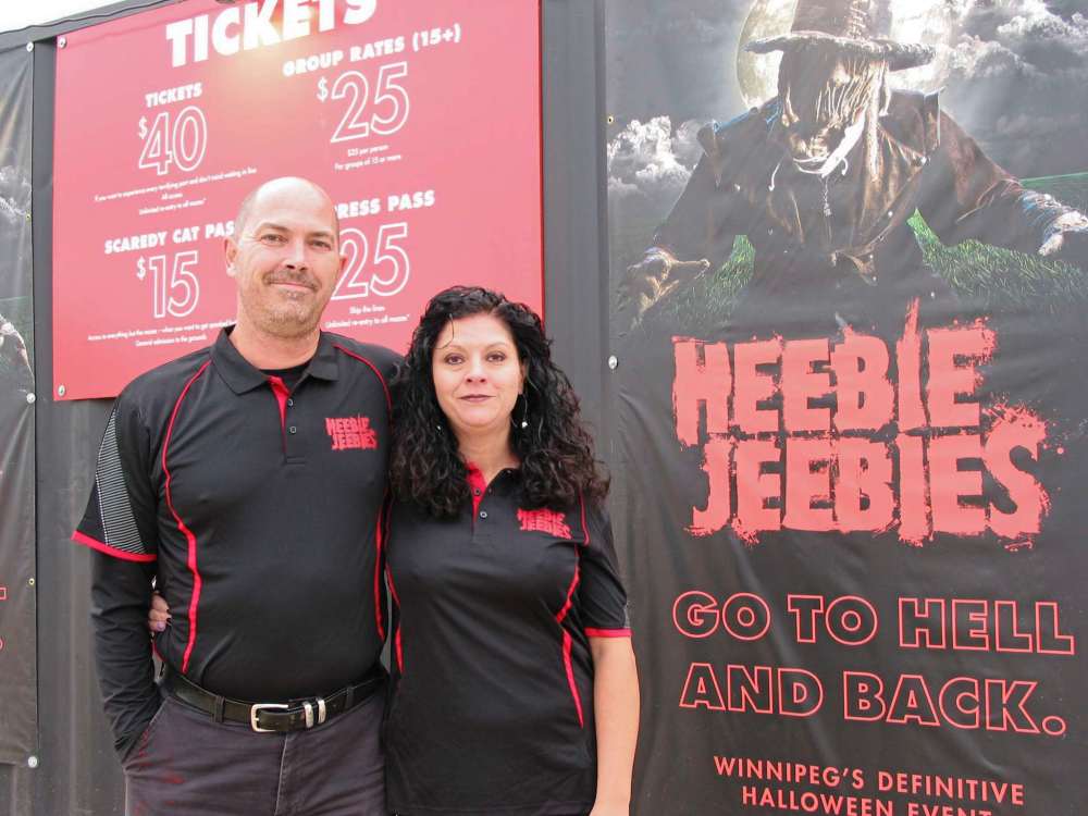 Tim and Michelle Muys are shown standing at the entrance to their haunted Halloween attraction, Heebie Jeebies, that they are operating this month at 53071 La Salle Rd. in the RM of Macdonald.