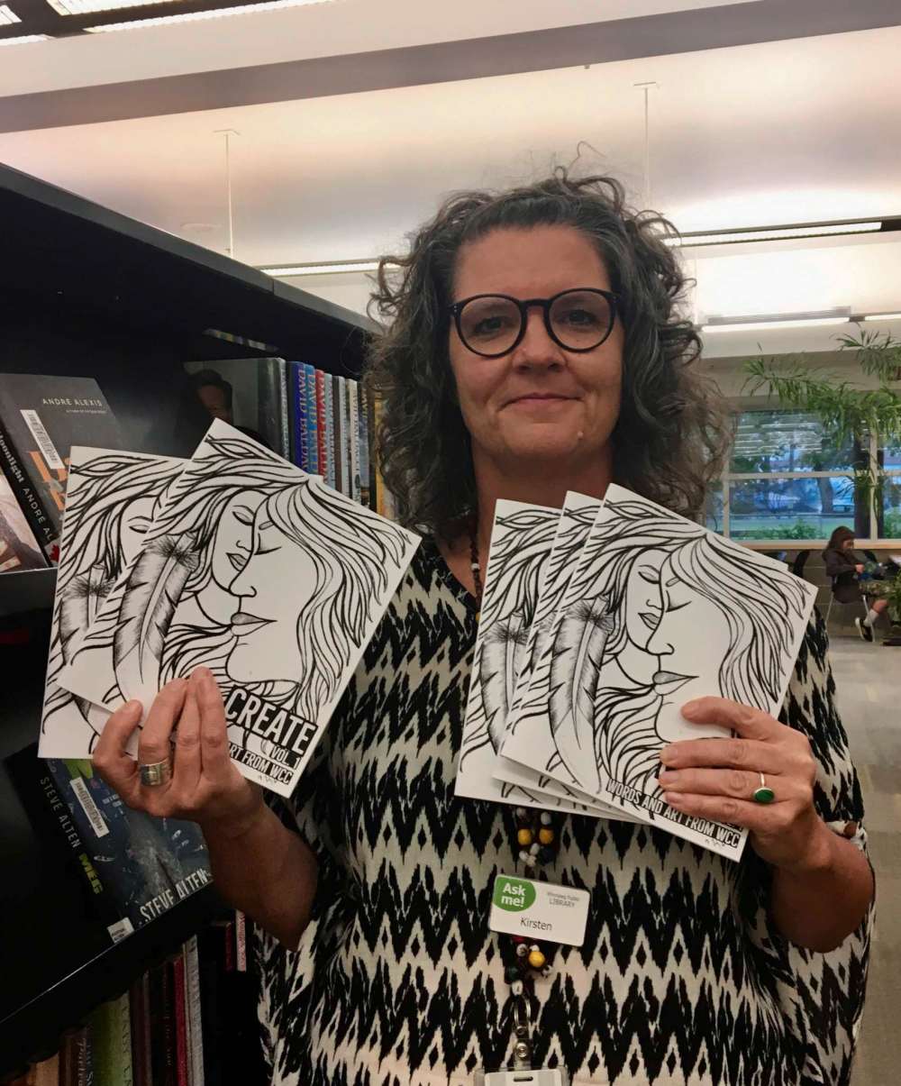 Supplied photo
Kirsten Wurmann, chair of the Manitoba Library Association’s Prison Libraries Committee, holds up a copy of Create: Words and Art from WCC, a chapbook containing stories, poem and art by incarcerated Manitobans.