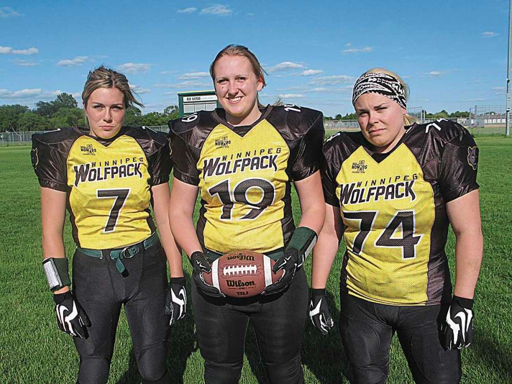 Photo by Jared Story
(From left) Winnipeg Wolfpack players Taylor Benne, Cheyann Boisvert and Reanne Cairns. The Wolfpack will host the 2015 WWCFL Championship on July 4 at Investors Group Field.