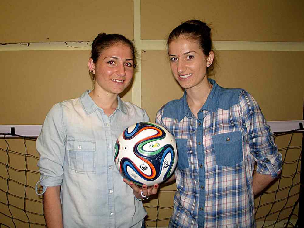 Photo by Jared Story
Sisters and Iraqi refugees Zainab (left) and Nazdar Hilo will carry the FIFA flag at the Women’s World Cup in June.