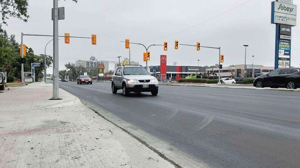 Photo by Tony Zerucha 
A new, pedestrian-activated crossing light will stop traffic to allow for safe crossings on Henderson Highway between Leighton and McLeod avenues.