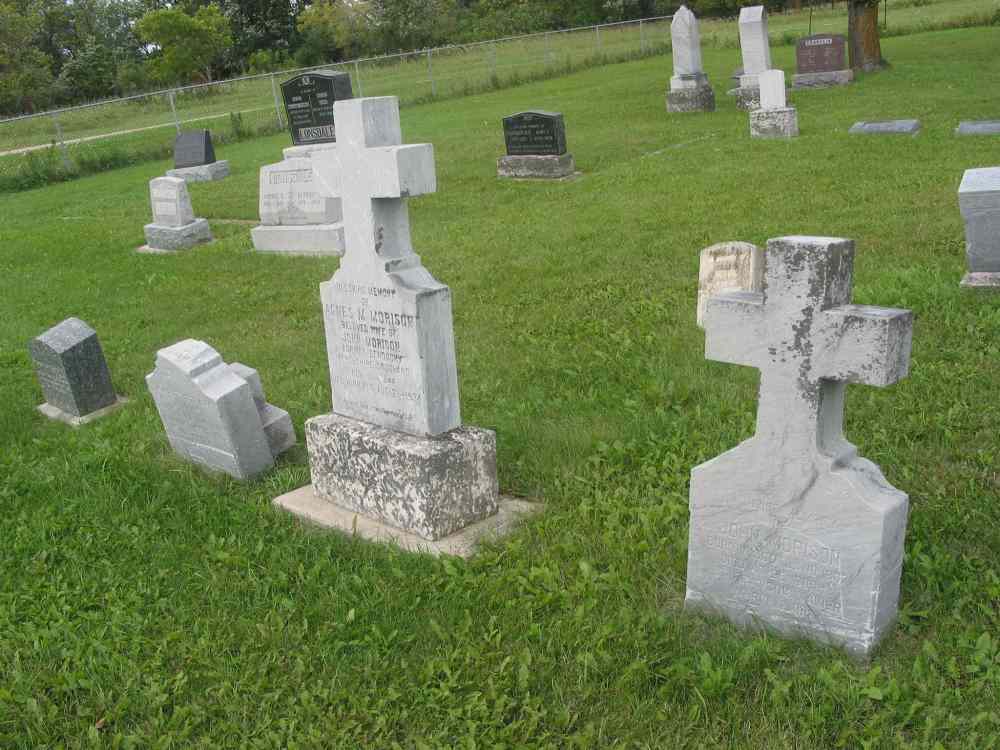 Andrea Geary
Tombstones in the Holy Trinity Anglican Church cemetery on Bresaylor Road symbolize the community’s long history.