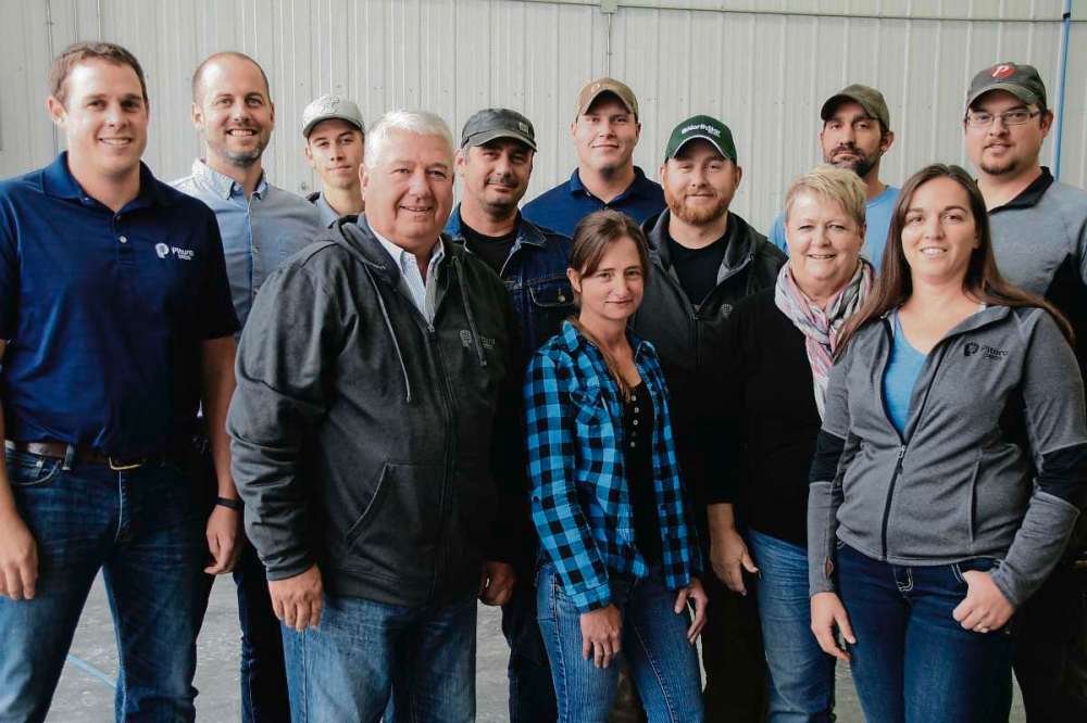 Supplied photo
Pitura Seeds owners and staff include (from left) sales agronomist Laird Lampertz, president and general manager of Pitura Seed Service Tom Greaves, production assistant Robbie Hamilton, Pitura Seeds chairman Calvin Pitura, seed plant production manager William Bunkowsky, contract production agronomist Thomas Cuddy, yard and facilities assistant Helena Niessen, president and farm operations manager of Pitura Seed Farms Connor Pitura, owner Barb Pitura, shop foreman Jared Heide, office administrator Melissa Jones, and production assistant Cory Bartmanovich.