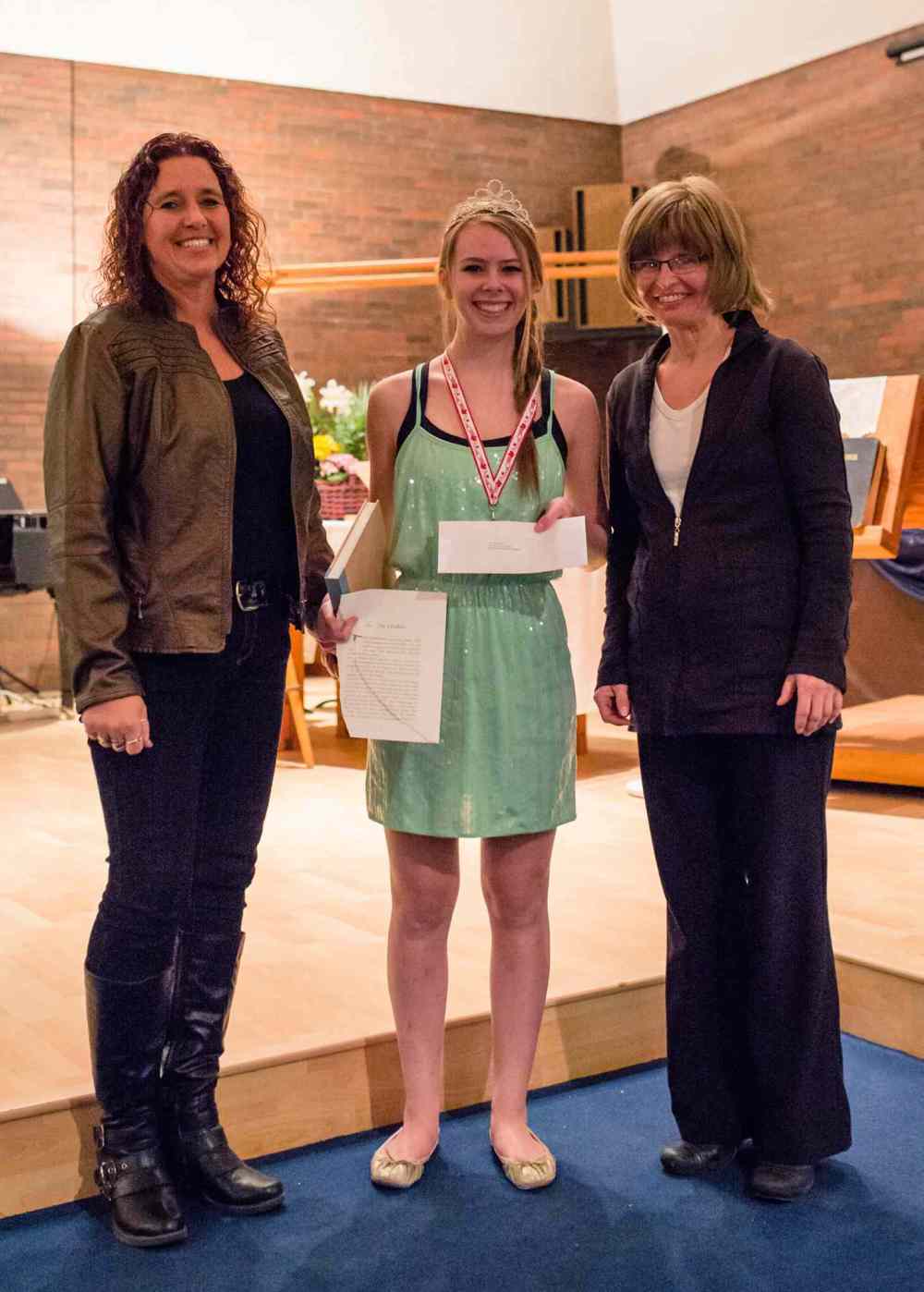 Submitted photo
Kendra Neufeld (centre) was given the musical theatre award from festival committee members (left) Cathy Arnal and Debbie Jonasson.