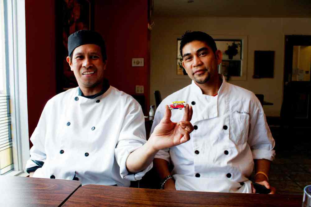 Cindy Chan
Nelson Olegario (left) and Nelson Varias said their restaurant Jeepney, with third partner Albert Lalu (not pictured), is named after a Filipino mode of transportation. Olegario is seen holding a toy jeepney.