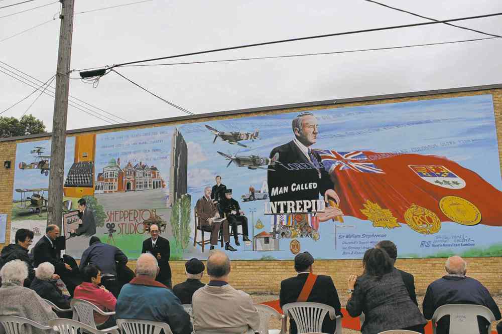 Cindy Chan
The West End BIZ (Business Improvement Zone) unveiled its latest mural, A Man Called Intrepid, on Oct. 1 on the side of the Royal Canadian Legion No. 1. The mural shares the story of Sir William Stephenson, who lived in the West End for a period in his life and served as the inspiration for James Bond.