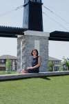 Danielle Da Silva - Sou'wester
Tracy Arias is pictured on June 20 at the Bridgwater Lakes fountain, which had been out of operation for the season due to a conflict between the City of Winnipeg and the developer, Manitoba Housing. The fountain was turned on June 22 after an arrangement was made between the two parties.