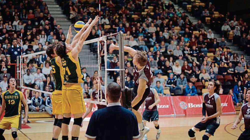Danielle Da Silva
Buckeyes Mitchell Keber and Serge Girouard go up to block a shot from St. Paul’s at the AAAA volleyball championship Nov. 30.