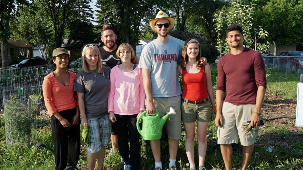 Danielle Da Silva - Sou'wester
Volunteer gardeners pause for a photo on a Wednesday evening in the People Garden in Riverview. The vegetable garden is part of the South Osborne Permaculture Commons by the Sustainable South Osborne Community Co-op. Part of the food produced in this garden is sold to pay wages for garden stewards, some goes to the volunteers to tend to it, and the rest is donated for ‘food justice’ programs.