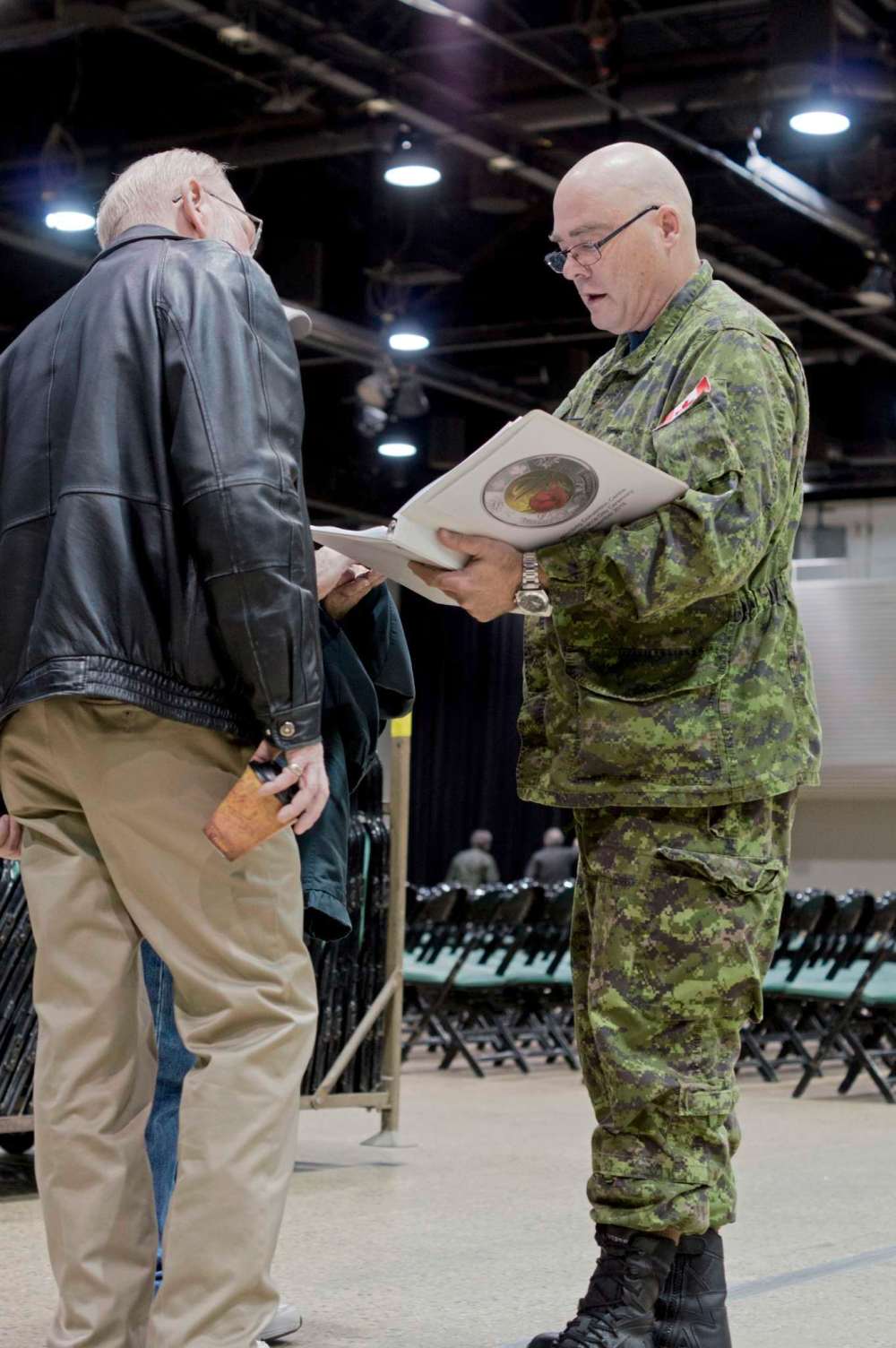 Danielle Da Silva - Sou'wester
Craig Frost, master warrant officer with 1 Canadian Air Division, goes over plans for the annual Remembrance Day ceremony organized by the Joint Veterans Association with Stan Lopata, a representative of the Hong Kong Veterans Association.