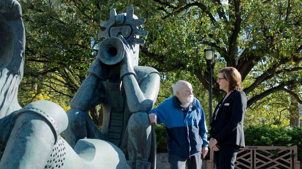 Danielle Da Silva - Sou'wester
Artist Ivan Eyre and Assiniboine Park Conservancy CEO Margaret Redmond speak next to Eyre’s newly unveiled Plains Call sculpture in front of The Pavilion.