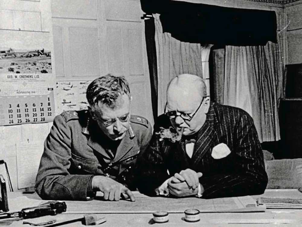 Library and Archives Canada
Winston Churchill and Maj.-Gen.l P. J. Montague review a map at Canadian Military headquarters in March 1941. Around that same time, streets were named for each of them in the newly created Riverview subdivision.