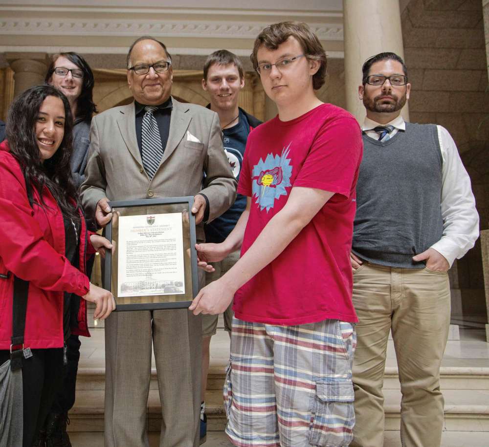 Supplied photo
Collège Béliveau students and MLA Bidhu Jha hold a copy of the Private Member’s Statement Jha presented in the Manitoba legislature. They are joined by history teacher Joël Tétrault (right).