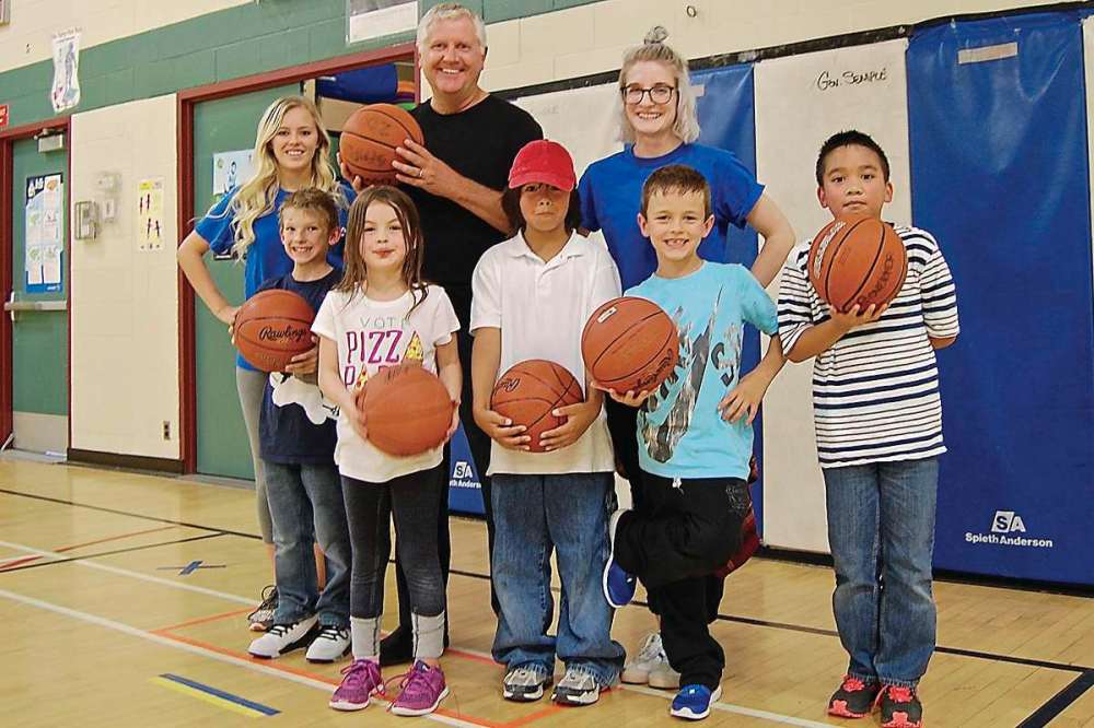 Supplied photo
Gord Mackintosh at Governor Semple School with some KYAC kids and their after-school program supervisors.