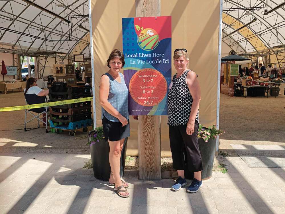 Supplied photo
Seine River MLA Janice Morley-Lecomte (left) got the lowdown on how the St. Norbert Farmers’ Market has adjusted to the COVID-19 pandemic from executive director Marilyn Firth.