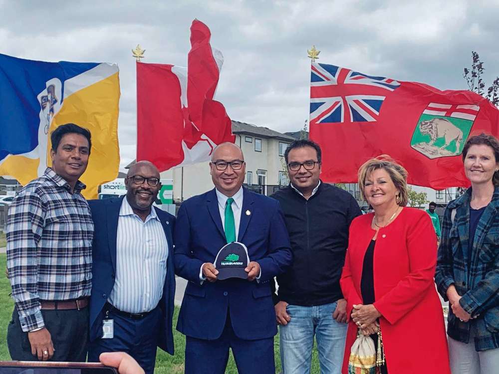 Supplied photo
Waverley MLA Jon Reyes (centre) was joined by (from far left) Paramjit Shahi, president of South Winnipeg Community Centre; Coun. Markus Chambers (St. Norbert-Seine River); ; community member Amit Bindra; Coun. Janice Lukes (Waverley West); and Pembina Trails school trustee Julie Fisher at the announcement of the South Winnipeg recreation campus.
