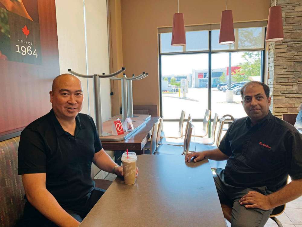 Supplied photo
Waverley MLA Jon Reyes enjoys an iced capp and conversation with Sumant Prabhakar, general manager at the Bridgwater Tim Hortons.