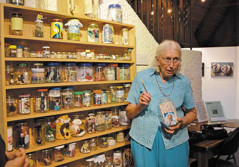Sou'wester
Annie Janzen explains the meaning of some of the jars in her exhibit My Life in Jars on 9 Shelves, on display at the Mennonite Heritage Gallery.