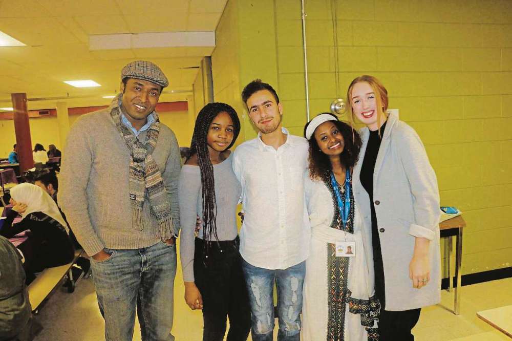 Sou'wester
Village Kitchen co-ordinator Faven Mergia (second from right) with some of the event's participants.