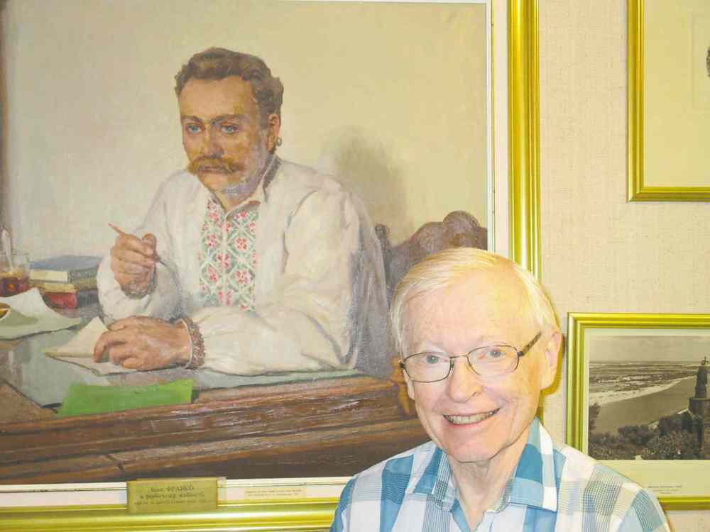 Photo by Martin Zeilig
Brent Stearns, chair of the board of directors of Wnnipeg’s Ivan Franko Museum, stands under a portrait of Franko, a Ukrainian writer and thinker.