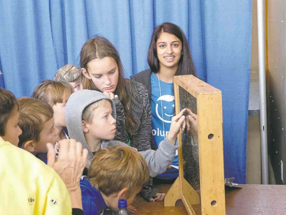 Photo by Adriano Magnifico
J. H. Bruns Collegiate student Aneet Goraya (in blue, facing camera) takes part in Agriculture in the Classroom Manitoba’s Amazing Agriculture Adventure.