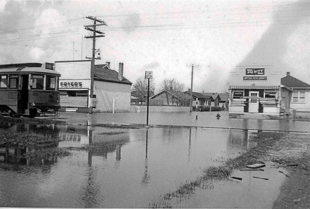 St. Vital Historical Society
A recently discovered photo of St. Anne’s Road at Imperial Avenue during the 1950 flood, depicting a stranded streetcar; Fryer’s Grocer and Imperial Meat Market.
