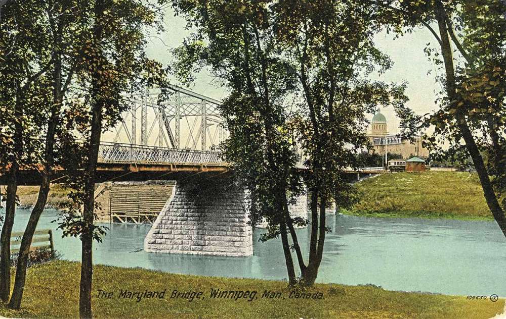 Photo supplied by Giles Bugailiskis
An early postcard of the first Maryland Bridge, built in 1894, looking north. The building in the background was first the Winnipeg Maternity Hospital, renamed the Misericordia General Hospital in 1917.