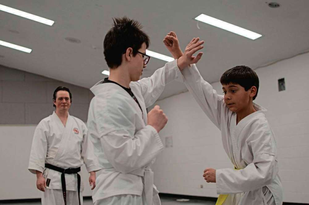 Eva Wasney
Students Austin Schwartz and Aahron Coward spar during a Chito-Ryu Winnipeg karate class at Roblin Park Community Centre.