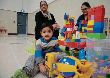 Eva Wasney
Karman Toor plays with a truck at Weston Memorial Community Centre's Bright Start program while his grandmother Kuldeep Kaur and NorWest Community Co-op practicum student Avneet Kaur look on.