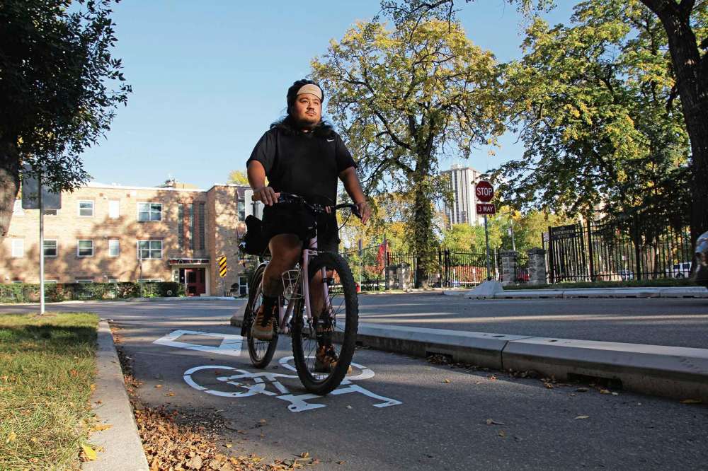 Katlyn Streilein
Reynold Beniza, 30, has raised concerns about the design of the new bike path system in Wolseley and West Broadway