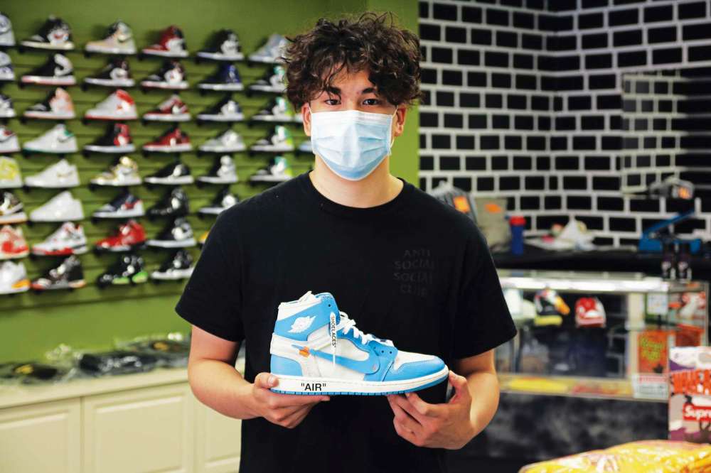 Photo by Katlyn Streilein
Aidan Litke holds his favourite shoe: an Air Jordan 1 Retro High Off-White University Blue.