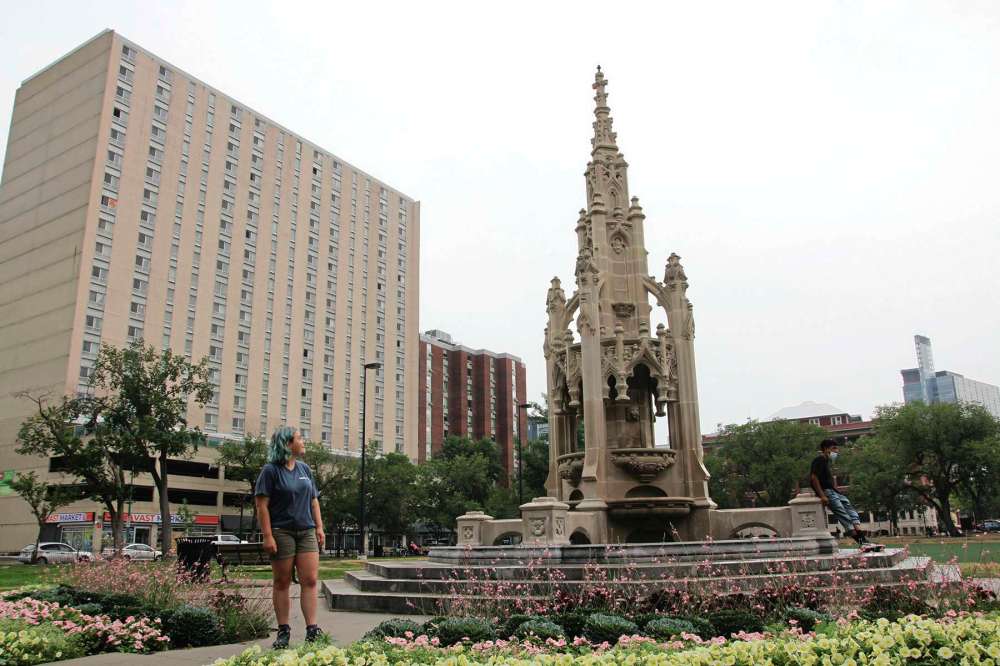 Photo by Katlyn Streilein
West End BIZ tour guide Iris Dyck stands near the Waddell Fountain at 410 Cumberland Ave.