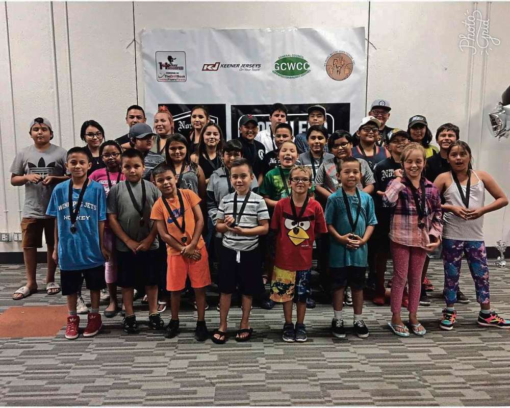 Supplied phjoto
The children at the North End Hockey Program got medals as a congratulation for their hard work and commitment. Transcona CrossFit is holding a fundraising event Oct. 7 to support the hockey program.