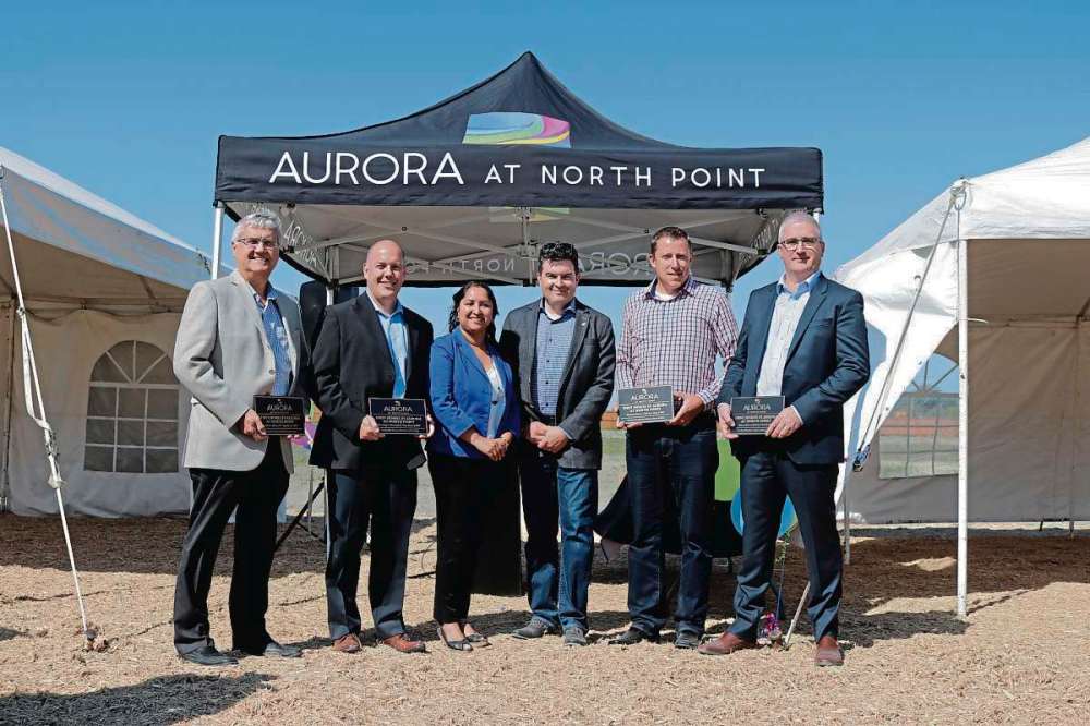 Photo by Ligia Braidotti
(From left) Ken Braun from Broadview Homes, Dave Woodard from Kensington Homes, Coun. Devi Sharma, Paul Moroz and Mike Newbury from Daytona Homes and Phil McAmmond from Sunrex Homes are shown at an announcement for Aurora at North Point on Sept. 7.