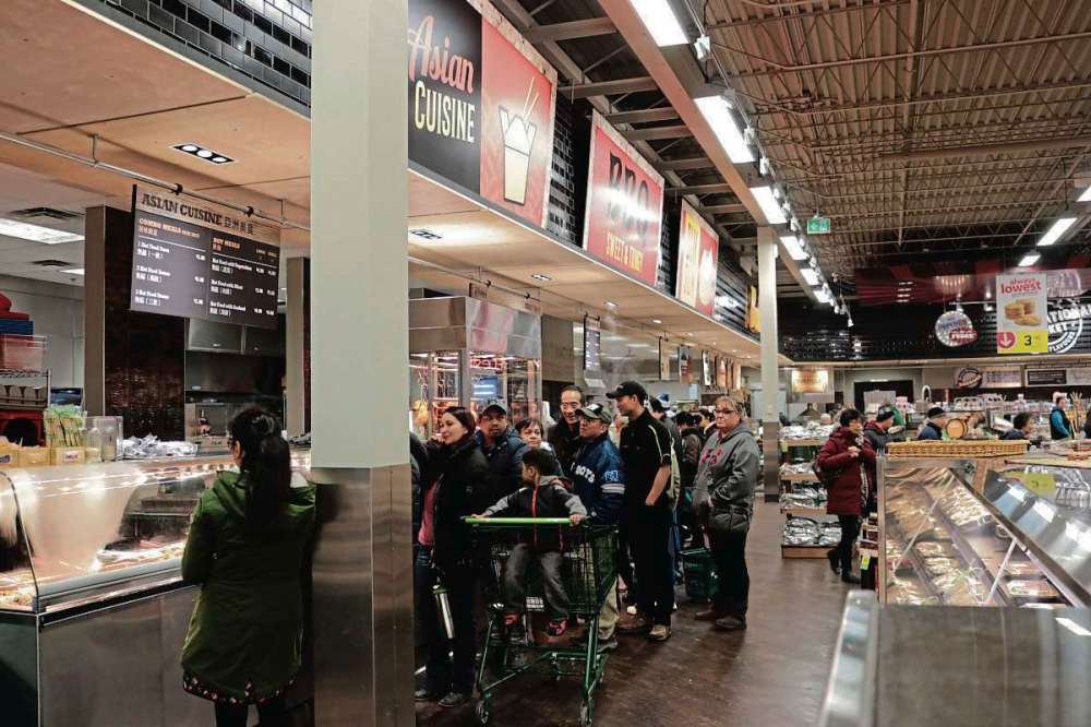 Ligia Braidotti
Shoppers line up at the Save-On-Foods International Northgate restaurant to try their diverse food selection.