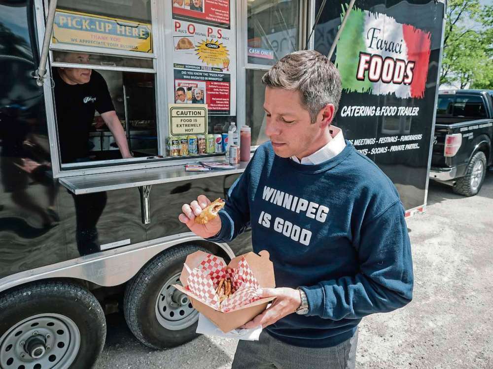 Supplied photo
On June 5, Mayor Brian Bowman visited Anthony Faraci’s food truck to taste Faraci's uncle Paul's Original Pizza Snacks.