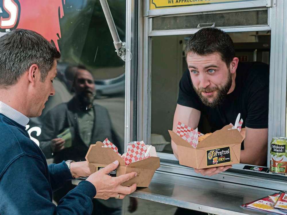Supplied photo
On June 5, Mayor Brian Bowman visited Anthony Faraci’s food truck to taste Faraci's uncle Paul's Original Pizza Snacks.