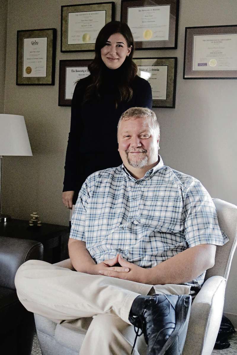 Photo by Ligia Braidotti
Jason Ediger and Katherine Kenyon are two of five staff members working at the Cognitive Behavior Therapy Institute of Manitoba office in Riverbend.
