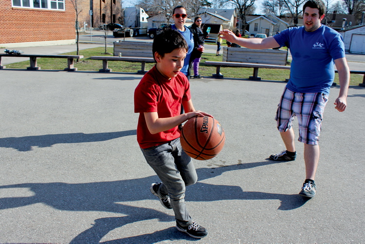 Matt Preprost
Edmund Partridge student Tomas Brown tries to deke KYAC volunteer Nathan Boutin during a game of basketball last week.