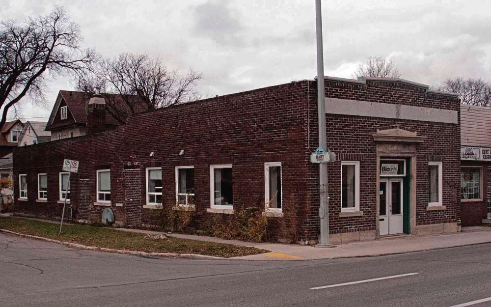Sheldon Birnie
The building at the corner of Hart Avenue and Henderson Highway was built in 1929 to house McLean Printers Ltd., the publishers of the Elmwood Herald. Today, nearly 90 years later, the building is home to Bioarts Dental Studio.