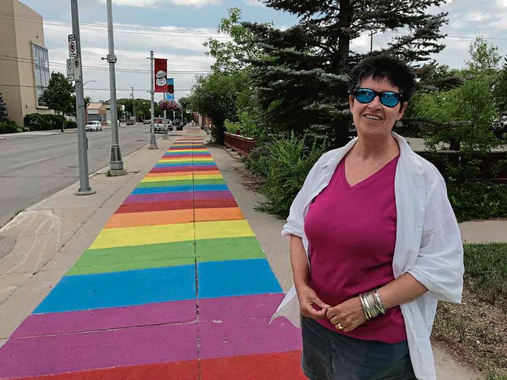 Sheldon Birnie
Alex Morrison, executive director of the Transcona BIZ, said the new Welcome Mats sidewalk murals are intended to invite people to “follow the rainbow to the pot of gold” that is Transcona’s downtown. (SHELDON BIRNIE/CANSTAR/THE HERALD)