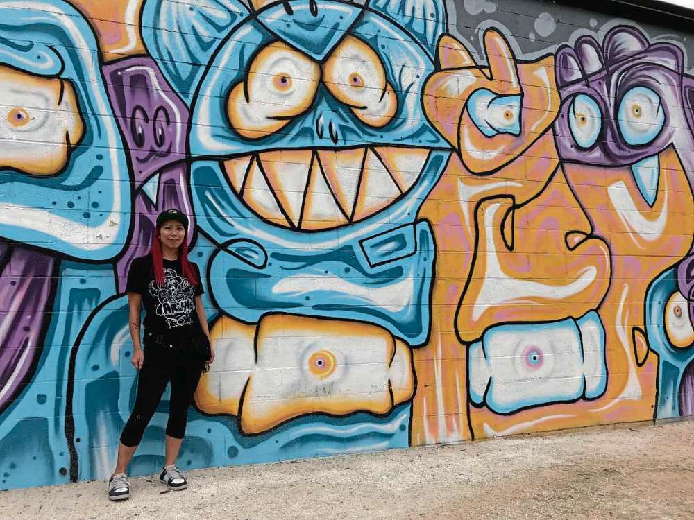 Sheldon Birnie
A new mural by Winnipeg artist Cathleen Hues, a.k.a. Pink Panda, on the north side of the Scout Hall at 110 Winona St. was unveiled by the Transcona BIZ on July 9. (SHELDON BIRNIE/CANSTAR/THE HERALD)