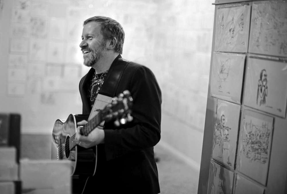 Supplied photo by Colin Corneau
Artist, musician and designer James Culleton is pictured performing at the recent opening of his new exhibit titled Lyrical Lines: Drawings by James Culleton at the Wayne Arthur Gallery.
