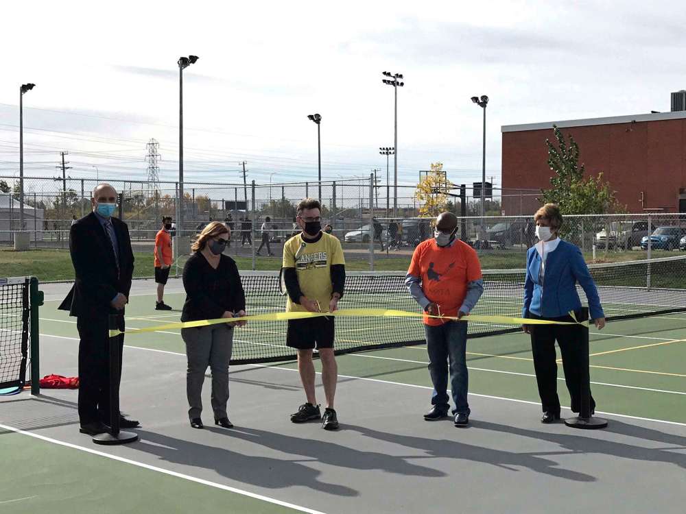 Supplied photo
From left: Dakota Collegiate teacher Dean Favoni; LRSD board chair Louise Johnston, Coun. Brian Mayes (St. Vital); Coun. Markus Chambers (St. Norbert-Seine River); and Dakota Collegiate principal Jill Mathez at the new tennis/pickleball courts recently.