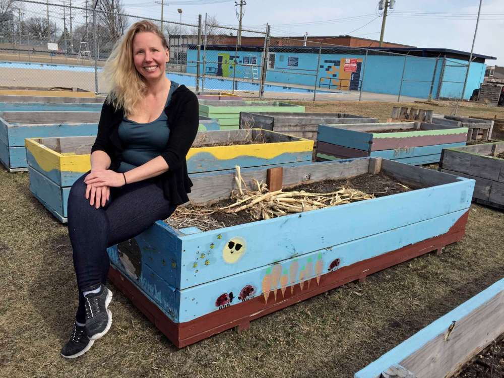 Simon Fuller
Winakwa Community Garden committee chair Christine Mousseau is pictured at the Windsor Park-based garden with some of its raised wooden garden boxes on April 7. At press time, some of the 38 boxes were still available for community members to rent.