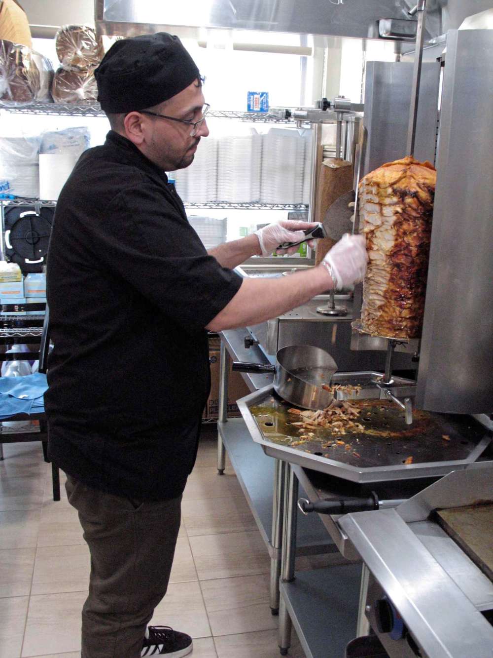 Simon Fuller
Chef Ahmet Brimo is pictured making a chicken shawarma wrap at Lamar Donair & Burgers. (SIMON FULLER/CANSTAR NEWS/THE LANCE)