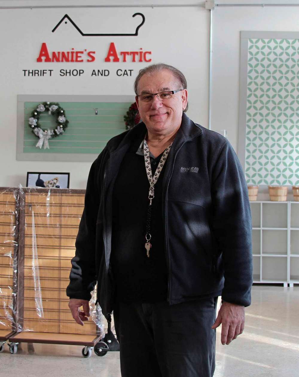 Photo by Sydney Hildebrandt
D’Arcy Johnston is the owner of Winnipeg’s first thrift shop-cat cafe, Annie’s Attic, which is opening on Main Street soon. Johnston also runs D’Arcy’s Animal Rescue Centre in St. James, and D’Arcy’s ARC Thrift Store also located on Main Street. Revenue from the second-hand businesses fund the work of the animal rescue. Patrons of Annie’s Attic will be able to shop for second-hand goods, grab a coffee, and visit with the in-house felines.