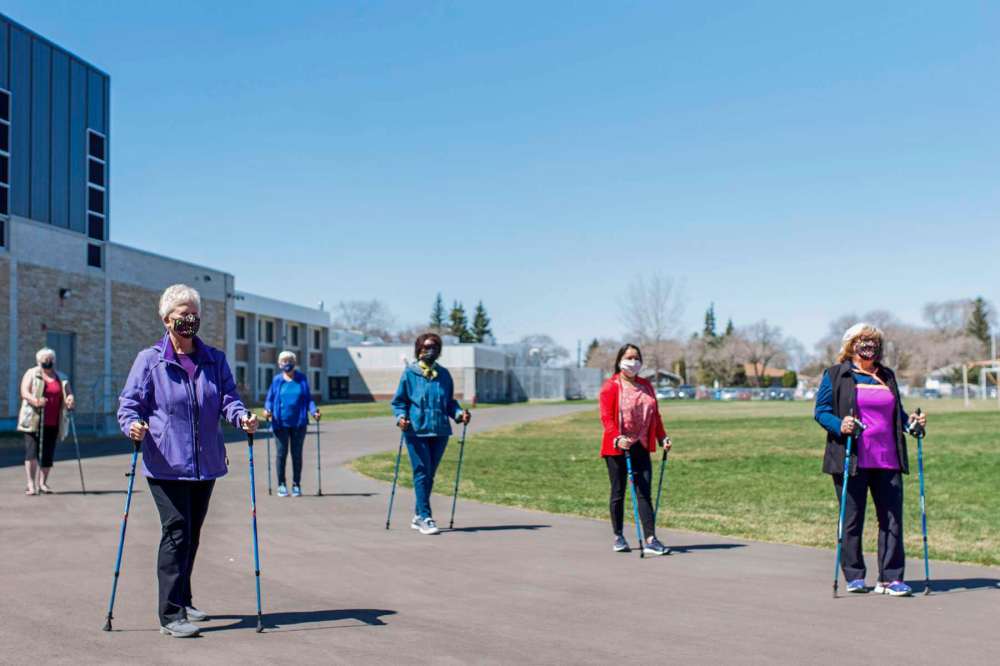 Supplied photo
Garden City seniors and Coun. Devi Sharma (Old Kildonan) walk the track at Garden City Collegiate.