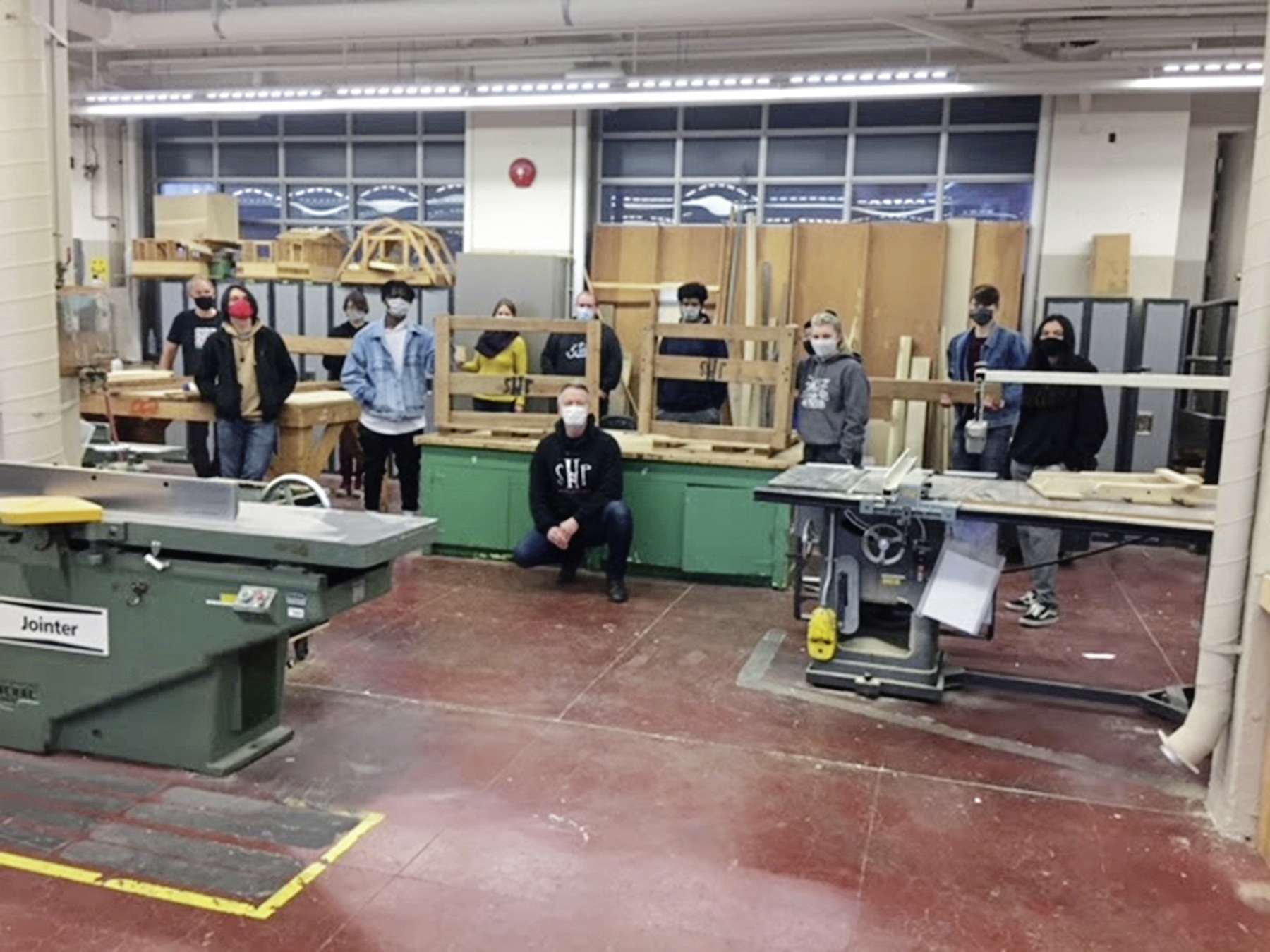 Students building beds for families in need Our Communities